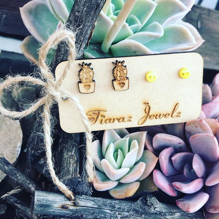 2x Pairs of Stainless Steel Stud Earring Pairs on a Wooden Board