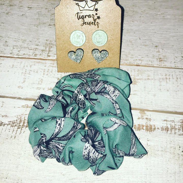 Hair Scrunchie and 3x pairs Stainless Steel Stud earrings on a Wooden Board
